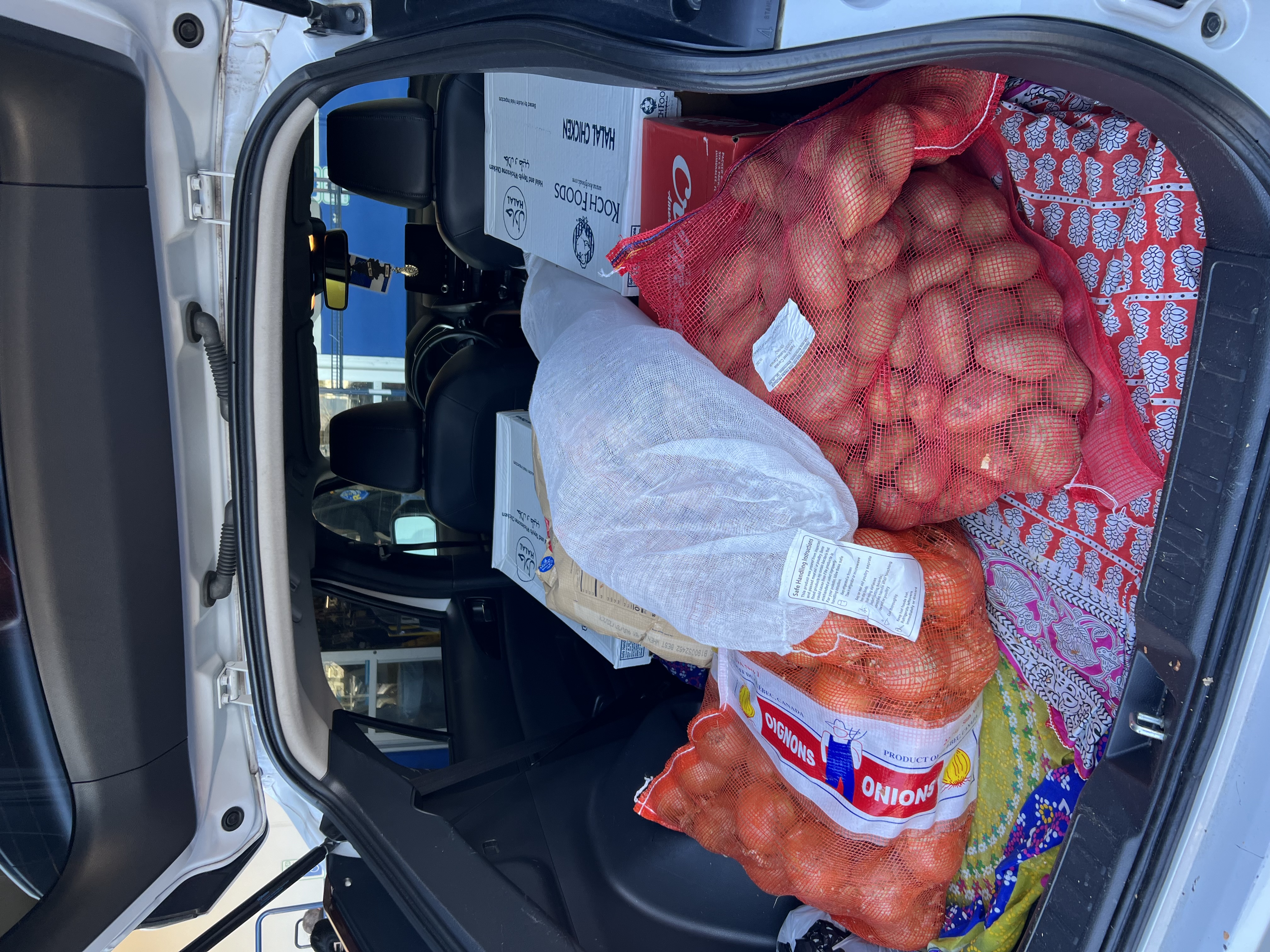 MWOA volunteers handing out food to families in need