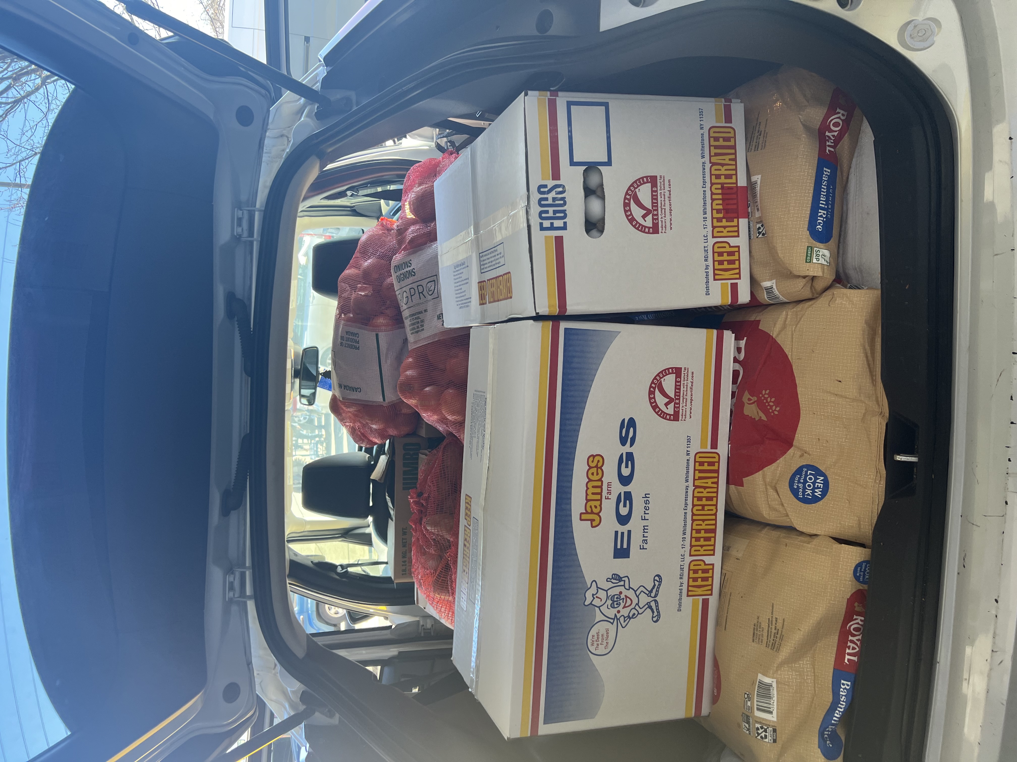 Food packages being handed to families